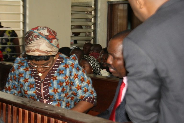 Dr. Angela Uwakwem (L) and Emmanuel Ajayi (M) during court proceedings