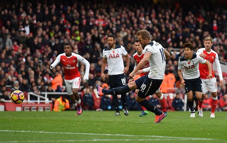 Harry Kane scored from the spot to hand Tottenham a draw against Arsenal at the Emirates Stadium Photo: Tottenham/Twitter