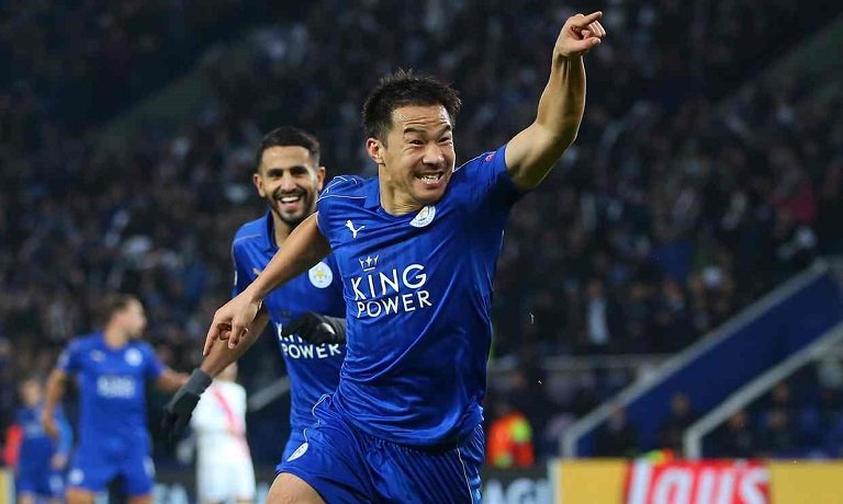 Shinji Okazaki celebrates after putting Leicester ahead in their fourth win of this Champions League campaign. Photograph: Catherine Ivill - AMA/Getty Images 