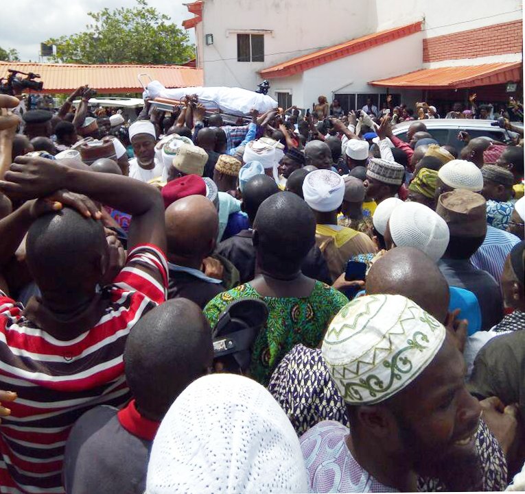 The body of former Sen Isiaka Adeleke being carried for burial