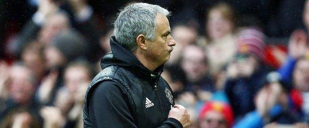 Jose Mourinho pointed to the Manchester United badge on his top as he left the pitch at full-time