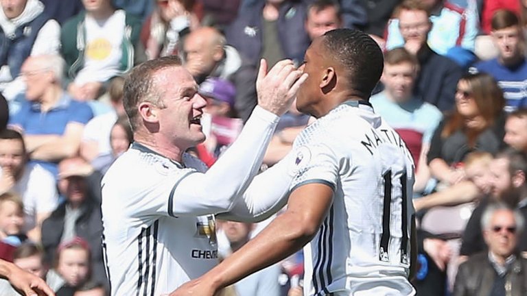 Rooney celebrates Anthony Martial's opener for United