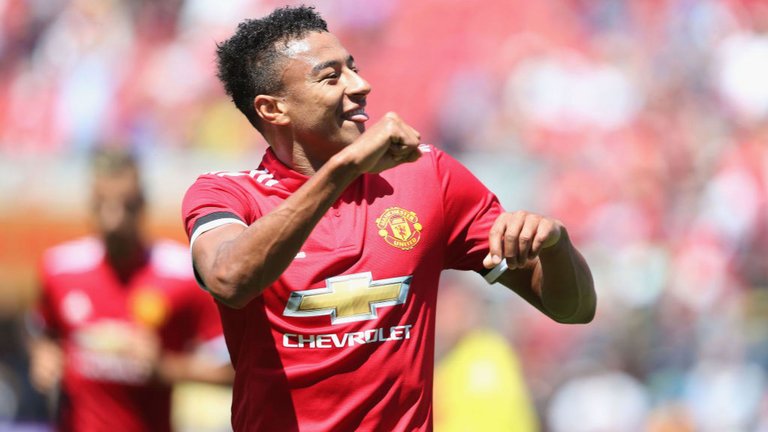 Jesse Lingard celebrates after opening the scoring against Real Madrid