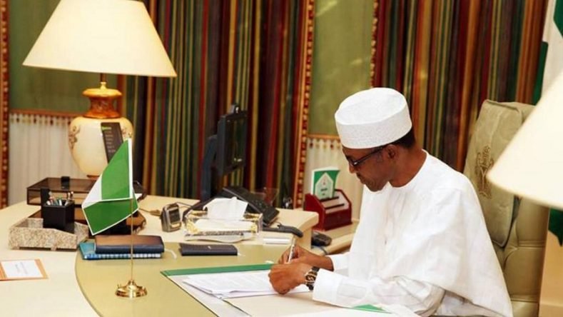 President Buhari signs anti-corruption agreement