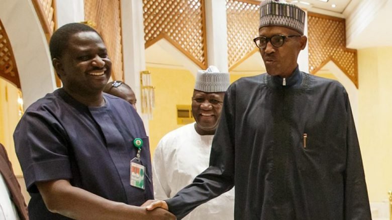 Femi Adesina (left) shakes President Muhammadu Buhari