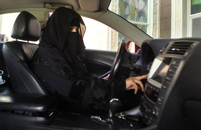 A woman behind the wheel in Saudi Arabia in 2013. The kingdom said on Tuesday that women would be allowed to drive starting in June 2018