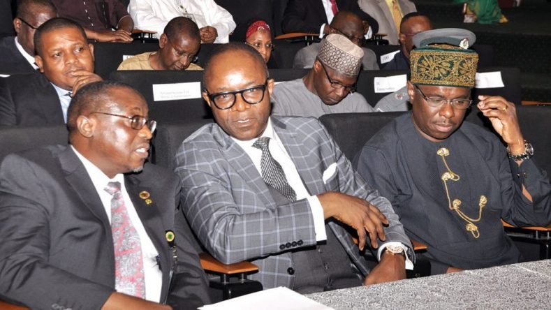 Group Managing Director, Nigerian National Petroleum Corporation (NNPC), Dr. Maikanti Baru (left); Minister of State for Petroleum, Dr. Ibe Kachikwu and Director General, Nigerian Maritime Administration and Safety Agency (NIMASA), Dr. Dakuku Peterside; at a meeting on change in trade terms from Free On Board (FOB) to Cost Insurance and Freight (CIF) in Abuja.