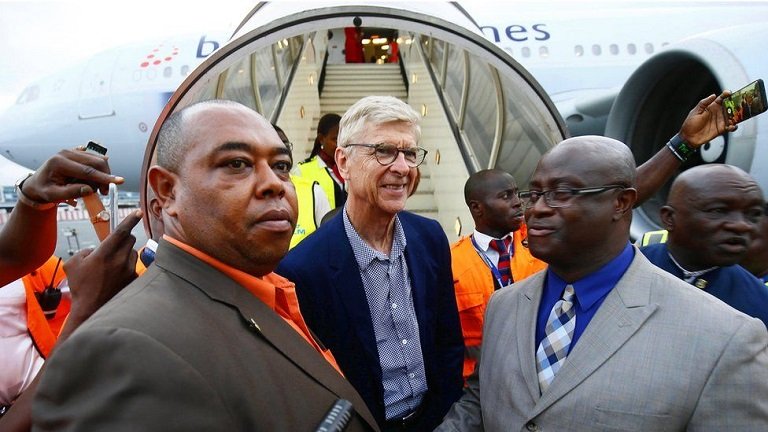 Arsene Wenger was received by a large crowd at the international airport in Harbel, 52km from Liberia capital, Monrovia