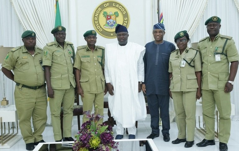 Lagos State Governor, Mr. Akinwunmi Ambode (middle); Secretary to the State Government, Mr. Tunji Bello (3rd right); Controller of Prisons, Lagos Command, Nigeria Prisons Service, Mr. Tunde Ladipo (3rd left); Deputy Controller of Prisons, Lagos Command, Mr. Seye Oduntan (2nd left); Superintendent of Prison, Lagos Command, Mr. Rotimi Oladokun (left); Deputy Controller of Prisons, Lagos Command, Mr. Emmanuel Oluwaniyi (right) and Assistant Controller of Prisons, Lagos Command, Comfort Obiosio (2nd right) during a courtesy visit to the Governor at his residence in Epe, Lagos, on Friday, August 24, 2018