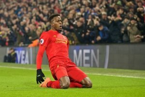 Liverpool cult hero Origi retires at 31 after trophy-laden career Divock Origi celebrating a goal for Liverpool during a UEFA Champions League match at Anfield.