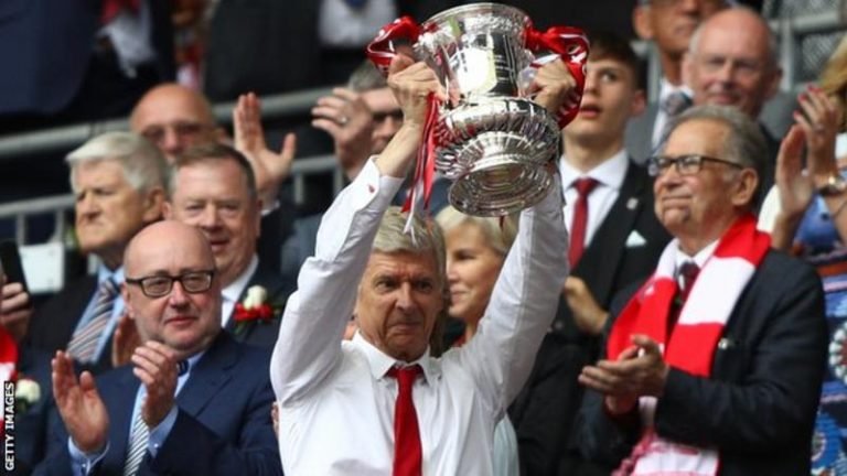Wenger targets Premier league title after signing new deal