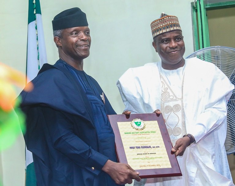 Governor Aminu Tambuwal of Sokoto presented a plaque to Vice President Yemi Osinbajo on behalf of Barewa Old Boys Association