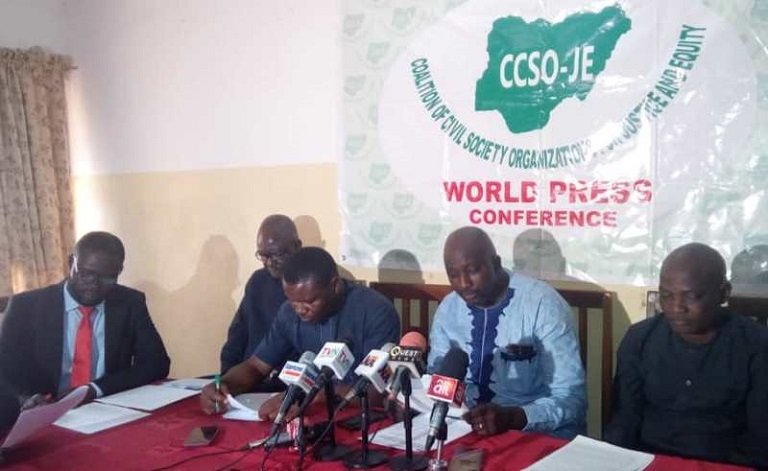 Group defends Buhari for not signing Electoral Act Members of CCSO-JE during a world press conference