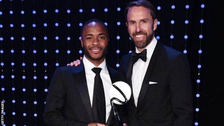 Raheem Sterling received his award from England manager Gareth Southgate