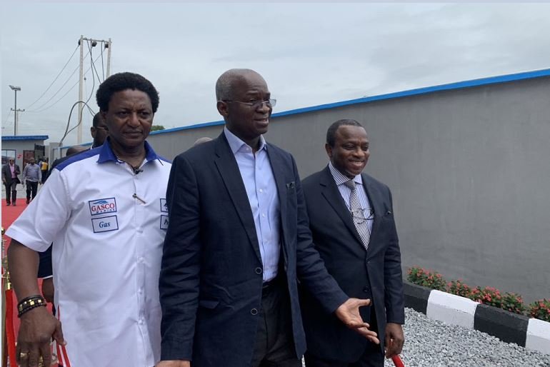 Gasco Marine MD, Bukola Badejo-Okusanya conducting Babatunde Fashola round their N2bn compressed gas plant in Abeokuta, Ogun state