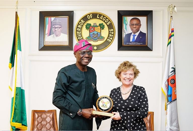 Lagos State Governor, Mr. Governor Babajide Sanwo-Olu (left), presents a plaque to British High Commissioner, Catriona Laing during her courtesy visit to the Governor at the Lagos House