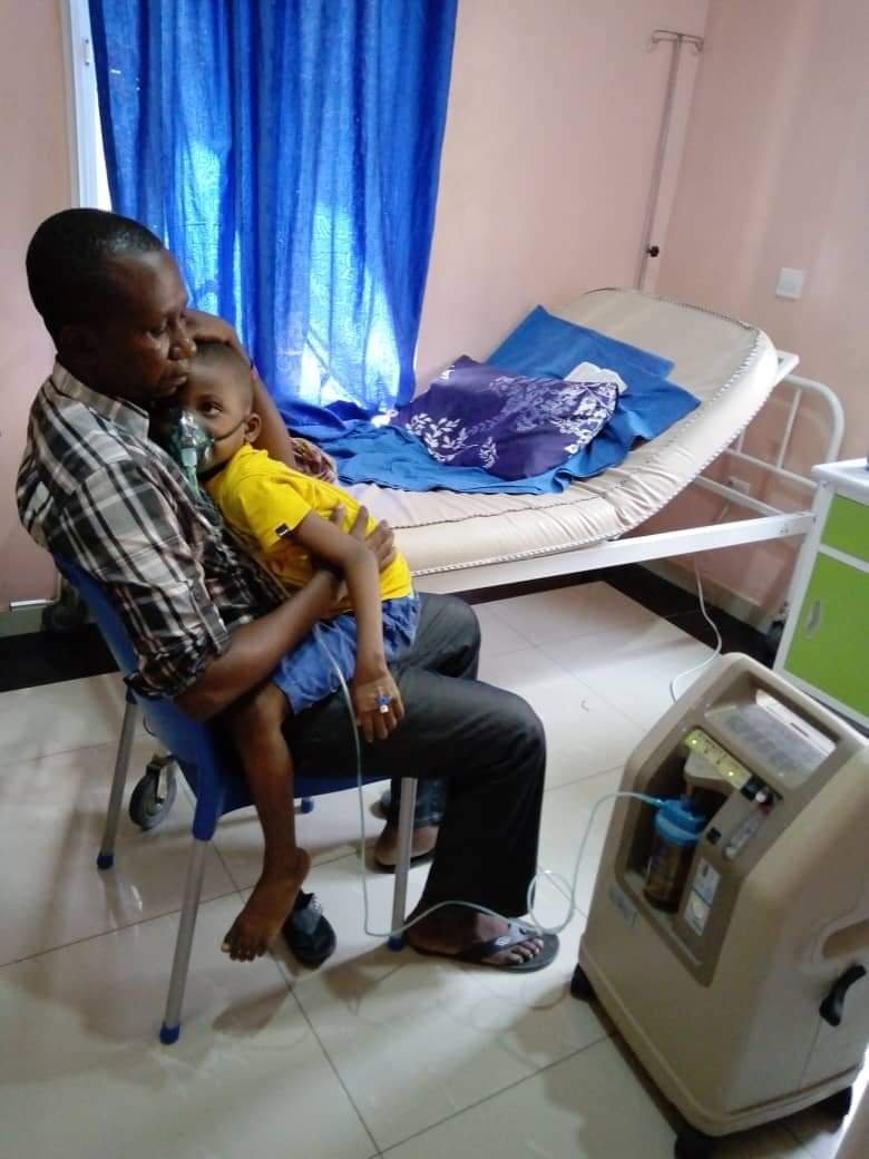 Prosper Chiebuka Chinonso in his father's arms