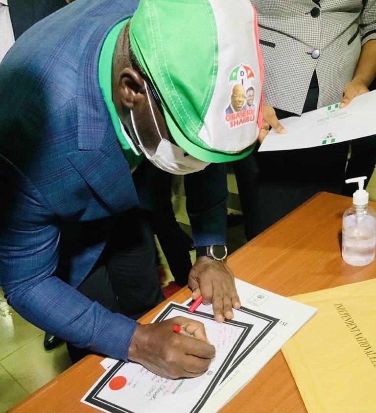 Obaseki signing his Certificate of Return