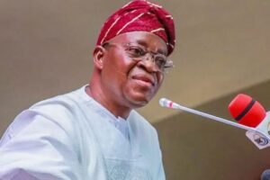 Adegboyega Oyetola speaking at a public event amid controversy over allegations linked to recent violence in Osun State.