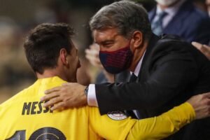 Xavi Lionel Messi and Joan Laporta