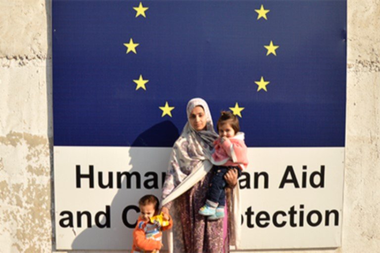 An Afghanistan Woman and her children