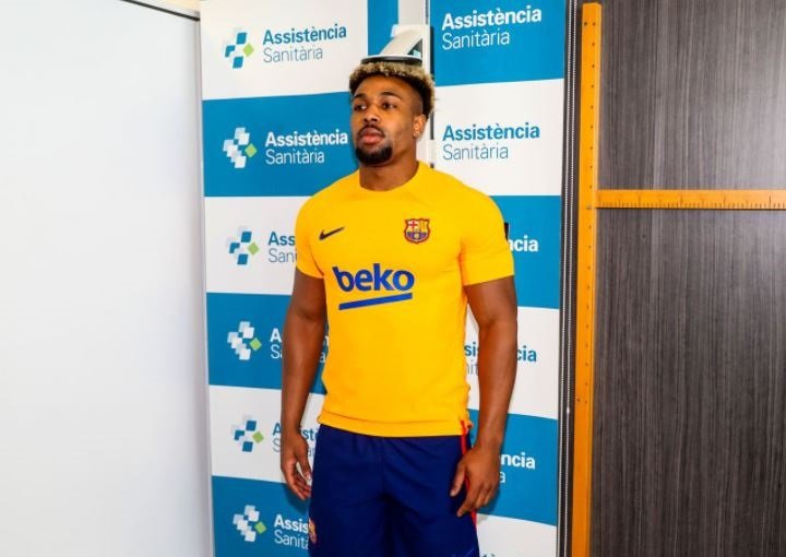 Barcelona sign Adama Traore from Wolves Barcelona have signed Adama Traore on loan from Wolves