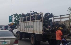 Lagos State Taskforce officials impounding commercial motorcycles during an enforcement operation along ECOWAS Road.