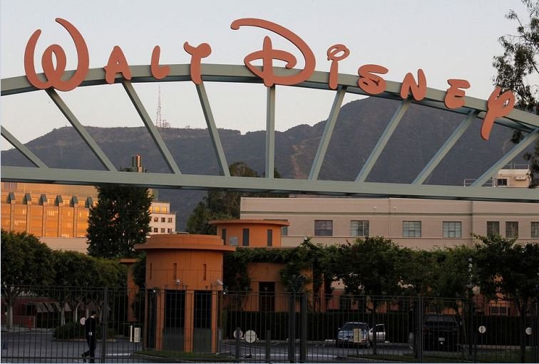 A portion of the signage at the main gate of The Walt Disney Co. is pictured in Burbank, California May 7, 2012. REUTERS