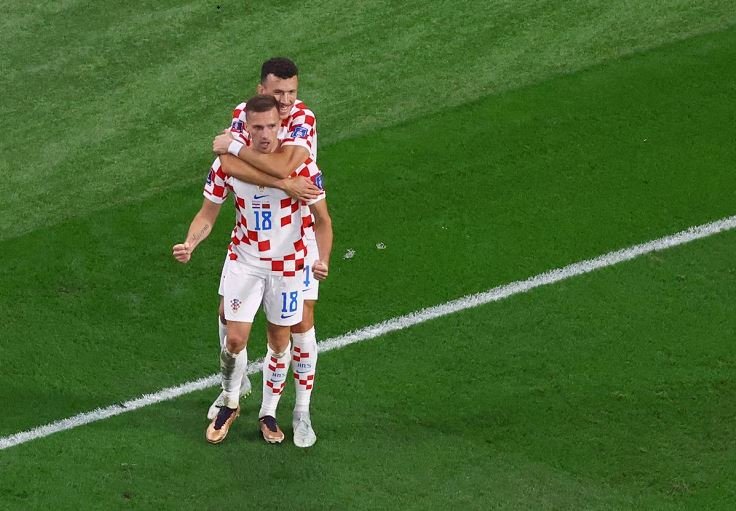 Croatia's Mislav Orsic celebrates scoring their second goal with Ivan Perisic