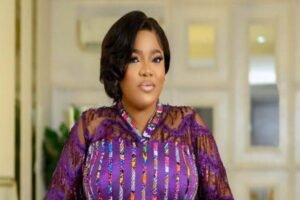 Actress Toyin Abraham speaking in a video interview about her career and earnings journey.