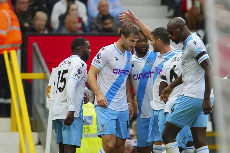 Man Utd beaten again as Palace storm Old Trafford Crystal Palace's Joachim Andersen, second from left, is congratulated after scoring his side's opening goal against Manchester United