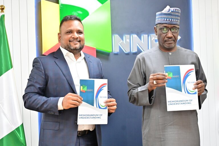 From left to right: MD/CEO of Africa Indorama Energy, Manish Mundra, and NNPC Ltd.'s GCEO, Mele Kyari, present a signed MOU