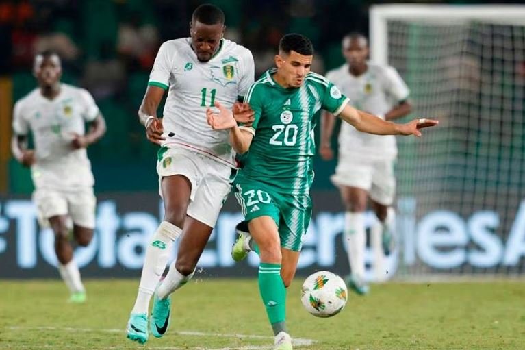 Mauritania's Souleymane Anne in action with Algeria's Youcef Atal in a Group D match at the African Cup of Nations REUTERS