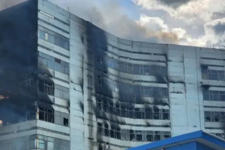 No fewer than eight people have died in an office building fire near Moscow, state-owned news agency Tass reports.
