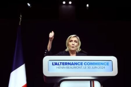 Marine Le Pen, French far-right leader and far-right Rassemblement National (National Rally - RN) party candidate, deliver a speech after partial results in the first round of the early French parliamentary elections in Henin-Beaumont, France, June 30, 2024. REUTERS