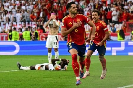 Merino scores late winner as Spain send host Germany packing Spain beat Germany in extra time to reach Euro semi-finals