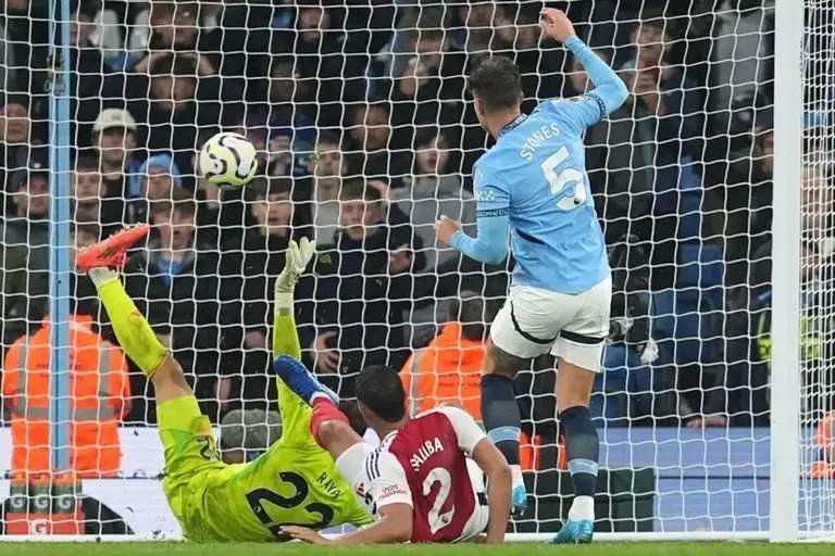 Trossard sees red as Man City late comeback to draw Arsenal John Stones scores Man City stoppage-time leveller against Arsenal