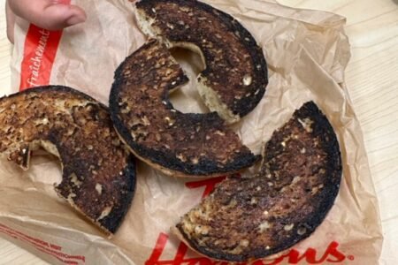 A customer @EAsMatter shares a burnt bagel order from Tim Hortons