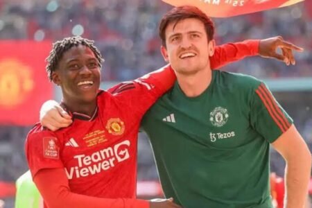 Manchester United teammates Kobbie Mainoo and Harry Maguire