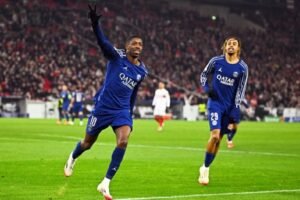 Dembele's hat-trick fires PSG into play-offs