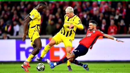 Dortmund Edge Past Lille to Secure Quarter-Final Spot