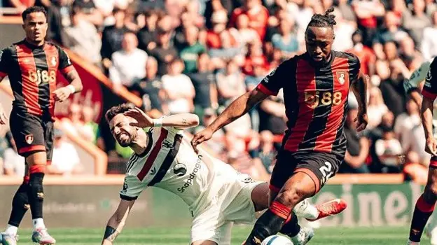 Man United snatch late draw to dent 10-man Bournemouth UECL hopes Man United captain Bruno Fernandes feels the pain as he is tackled by Bournemouth goalscorer Antoine Semenyo