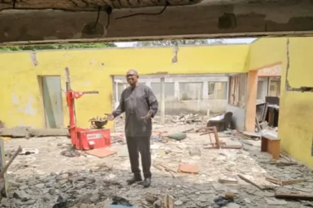 ‘No court order’, Obi fumes over demolition of brother’s property in Lagos Peter Obi in the ruins of the demolished property