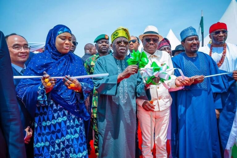 Tinubu to Wike, ‘join us, we’ll welcome you with open arms’ Tinubu and Wike at Abuja road inauguration