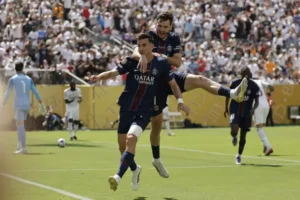 PSG top Ligue 1 with 3-2 victory against Metz PSG crush Real Madrid to set up Club World Cup final against Chelsea