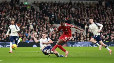 Isak, Ekitike score as Liverpool hold on to beat nine-man Tottenham