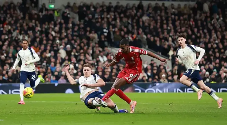 Isak, Ekitike score as Liverpool hold on to beat nine-man Tottenham