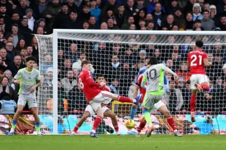 Man City go top with late Cherki winner at Nottingham