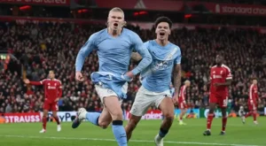 Man City snatch chaotic 2-1 win at Liverpool to stay on Arsenal heels