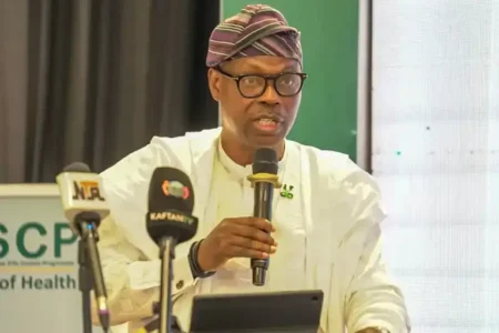 Iziaq Salako speaking at pandemic preparedness symposium in Abuja